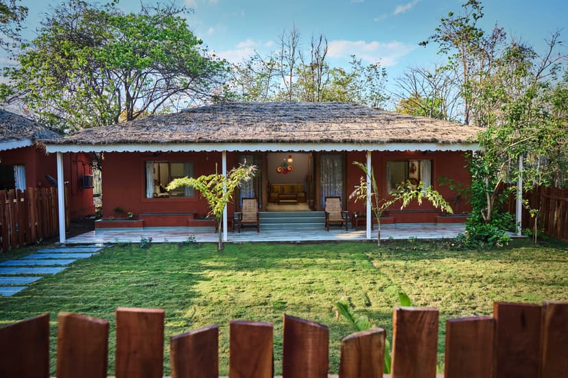 Exterior of Sal restaurant at Saj in the Forest resort, Pench, surrounded by natural greenery.