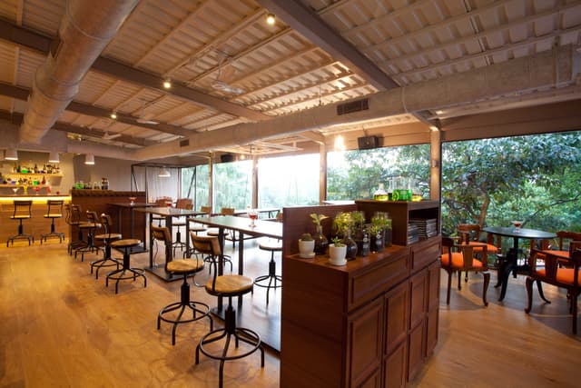 Modern, high-ceiling indoor dining facility at Saj On The Mountain.