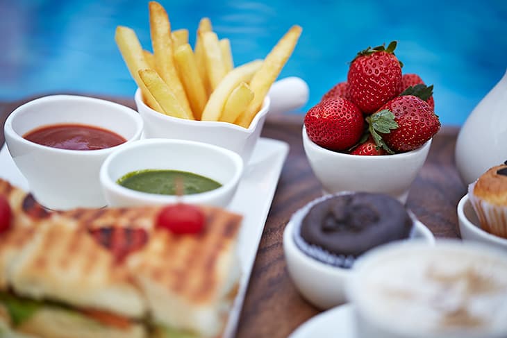 Freshly prepared appetizers at Saj Resort, a top-rated resort in Mahabaleshwar for family.