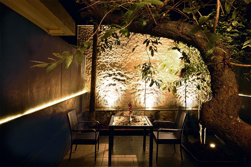 Cozy outdoor seating area at Saj Hotel Mahabaleshwar, perfect for a family holiday.